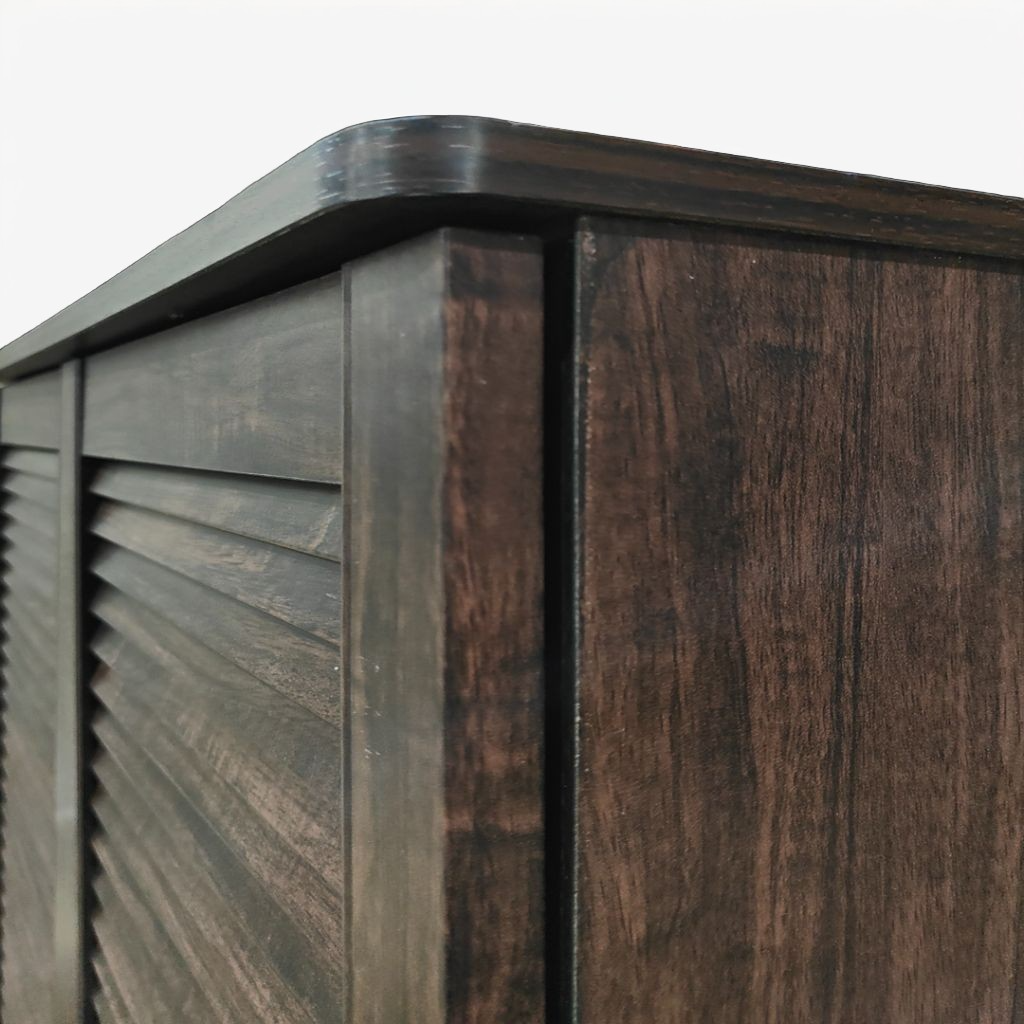 Recessed handle carved into door frame — groove sits flush, no protruding hardware